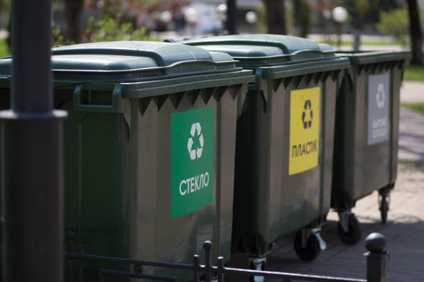 istock Garbage containers for separation and sorting in Russia with labels: Glass, plastic, household waste. 1224560482