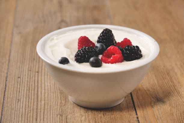 istock Composition of a typical genuine breakfast made with yogurt, blueberries, raspberries, blackberries 1224562070
