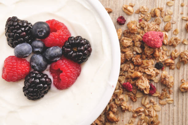 istock Composition of a typical genuine breakfast made with yogurt, blueberries, raspberries, blackberries 1224562368