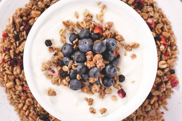 istock Composition of a typical genuine breakfast made with yogurt, blueberries, raspberries, blackberries, muesli 1224562437