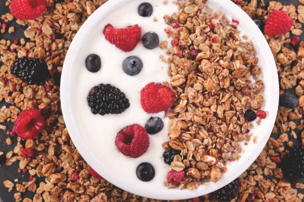 istock Composition of a typical genuine breakfast made with yogurt, blueberries, raspberries, blackberries, muesli 1224562628