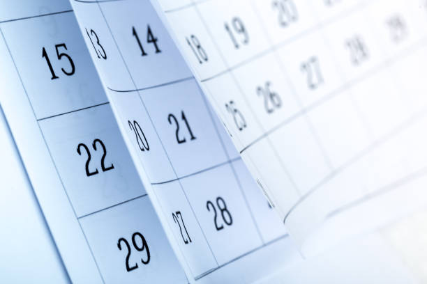istock Closes a calendar page in blue. flipping calendar 2020 1224569430