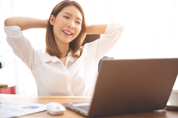 istock Young Chinese ethnicity woman using laptop browsing, working, meeting or online learning at home 1224569669