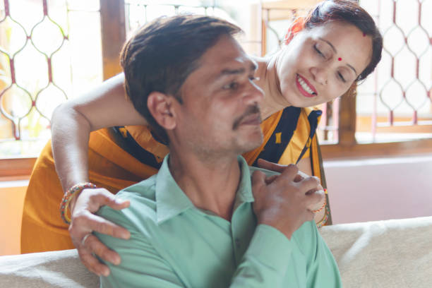 istock Smiling woman hugging her husband and spend time together happily. 1224570258