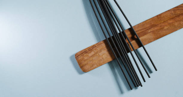 istock Sticks incense on a light background isolated banner. Natural aromatherapy 1224570906