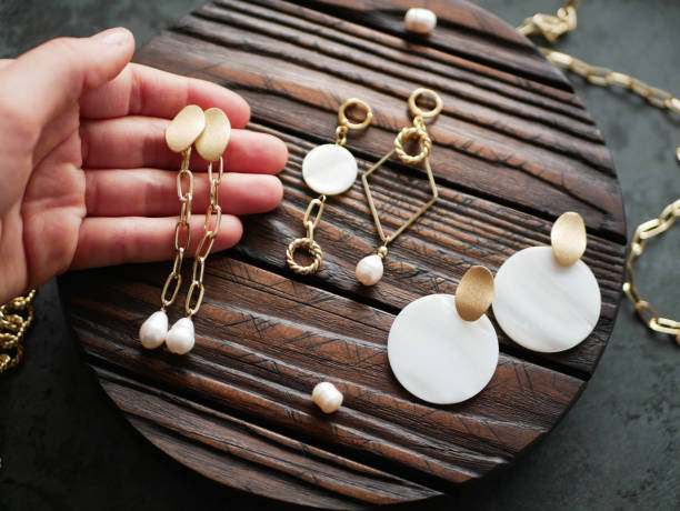 istock Gold jewelry in hand on a flat lay 1224574752