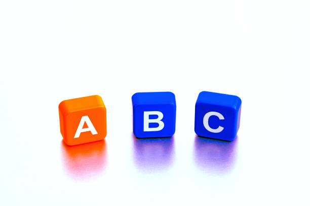 Childs ABC Learning Blocks.  alphabet blocks  on white background Isolated Childs ABC Learning Blocks. Educational Playful Toy Photography. report card stock pictures, royalty-free photos & images