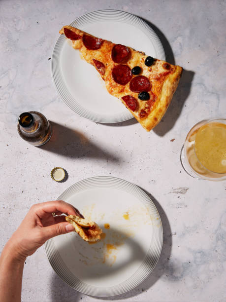 Pizza Diavola with Beer Before and After stock photo