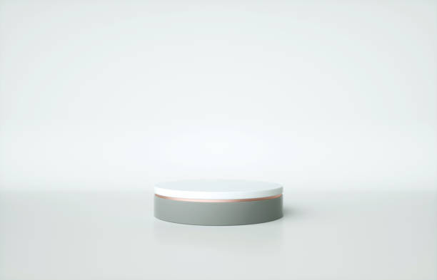 istock Cylinder pedestal with rose gold border isolated on white background. 3d render illustration 1224576971