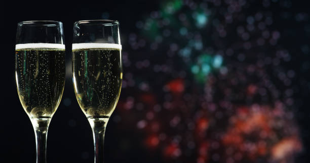 istock A champagne toast while in the background break out the fireworks. 1224578065