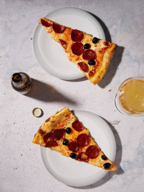 Pizza Diavola with Beer Before and After stock photo