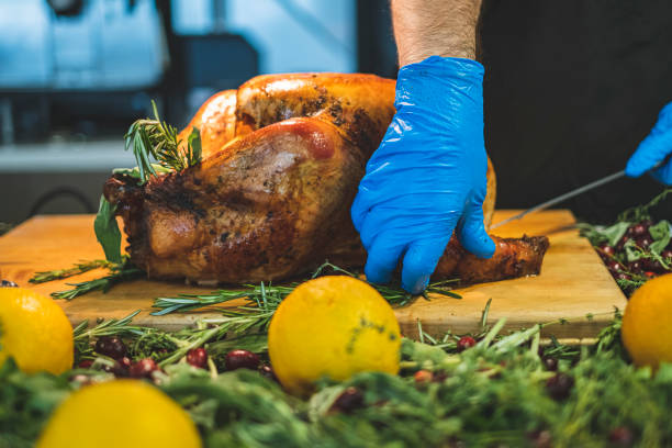 istock Person carving roasted turkey 1224578986