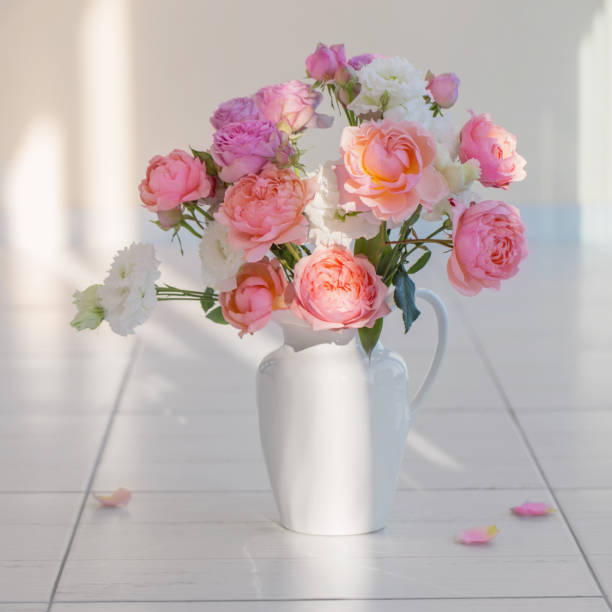 istock beautiful roses in ceramic white jug 1224582317