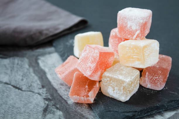 istock Turkish sweets (Turkish delight) of different colors in powdered sugar 1224582746