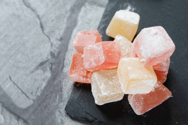 istock Turkish sweets (Turkish delight) of different colors in powdered sugar 1224582819