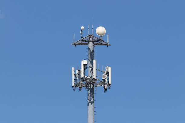 istock Telecommunications and wireless cell equipment tower with Directional Mobile Phone Antenna. 1224585872