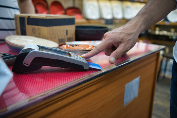istock man entering credit card password 1224587875
