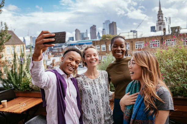 istock Group of diverse millennials drinking coffee and chatting 1224588002