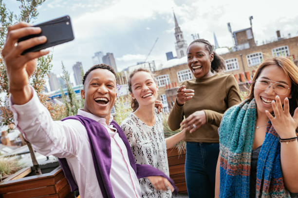 istock Group of diverse millennials taking selfie for social networks 1224588307