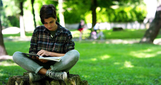 istock Young boy student, studying computer and is happy to learn new things 1224588668