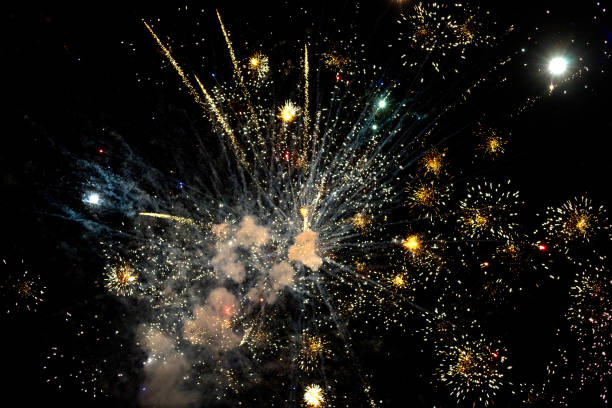 istock Low Angle View Of Firework Display Against Sky At Night 1224591240