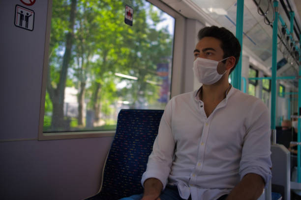 istock man wearing a protective mask in subway 1224595747