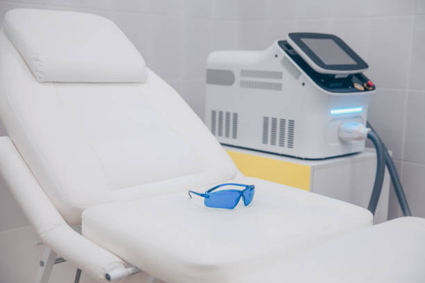 Medical equipment for cosmetology, laser epilation machine, beauty couch. stock photo