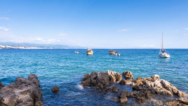 istock Landscape with rocks, sea and sailing ships 1224599505