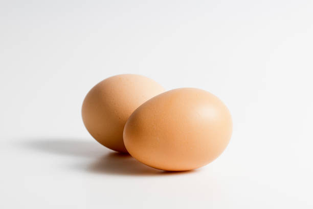 istock Close-Up Of Eggs Against White Background 1224599656