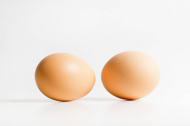 istock Close-Up Of Eggs Against White Background 1224599693