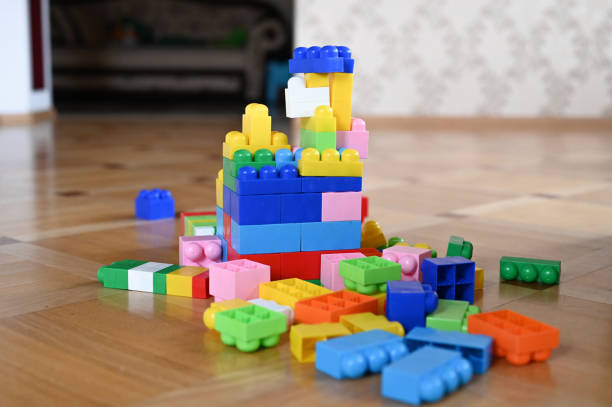 istock Multi-colored children's designer. scattered across the floor 1224599761