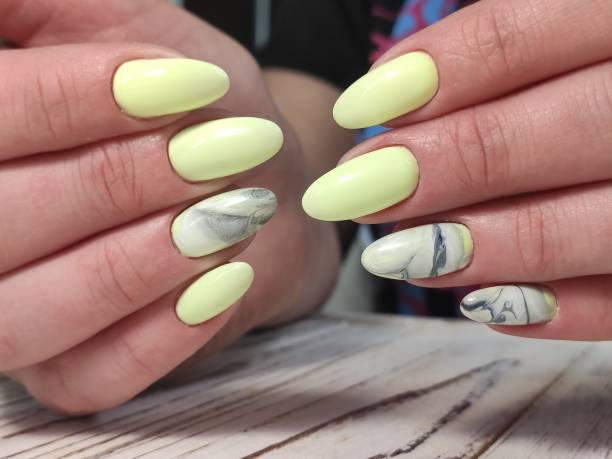 istock Manicured nails Nail Polish art design. Beauty hands. 1224609893