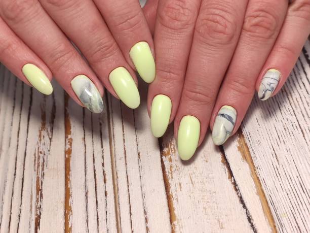 istock Manicured nails Nail Polish art design. Beauty hands. 1224609967