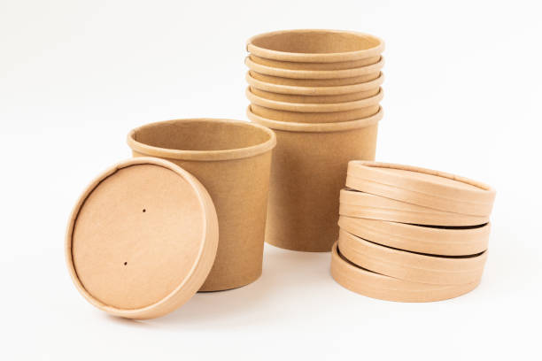 istock Eco friendly paper dishes. Craft cups, caps. Recyclable tableware for fast food. 1224610027