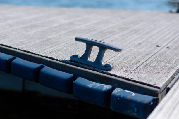 istock Pier on the river bank. Boat mooring hook. 1224615631