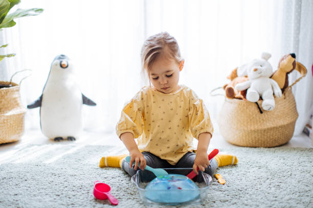 istock Little girl save the dinosaurs from iceberg 1224616511