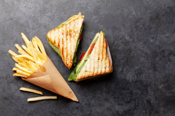 istock Club sandwich and potato fries chips 1224617251