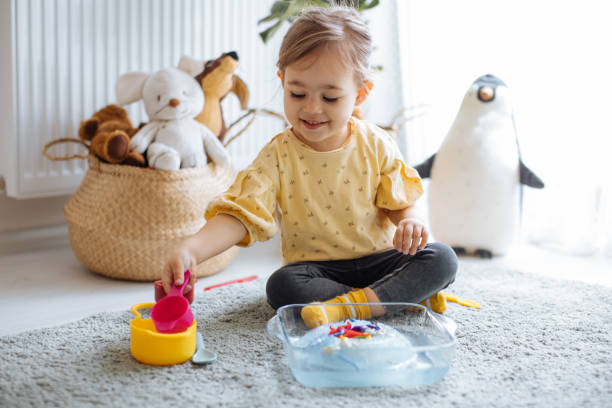istock Little girl save the dinosaurs from iceberg 1224618482