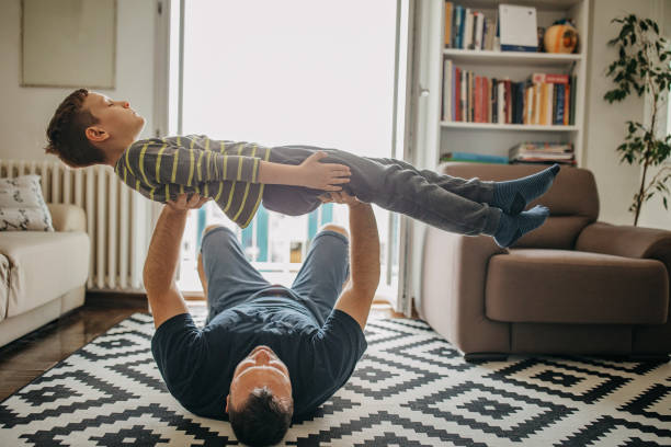 istock Mid adult woman exercising during lockdown 1224622313
