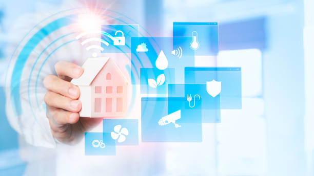 istock Assistant Smart home automation futuristic interface on virtual screen. Man's hand holding small house. 1224622835