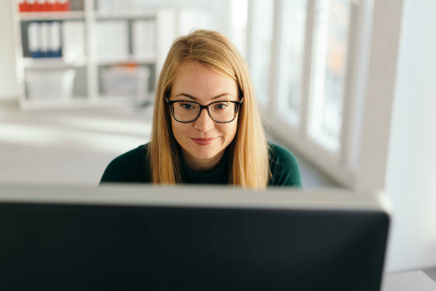istock Dedicated businesswoman working at her computer 1224623611