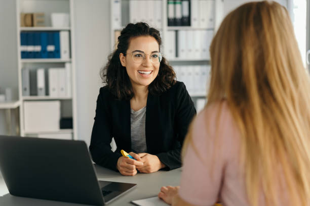istock Two young women having a business meeting 1224624216