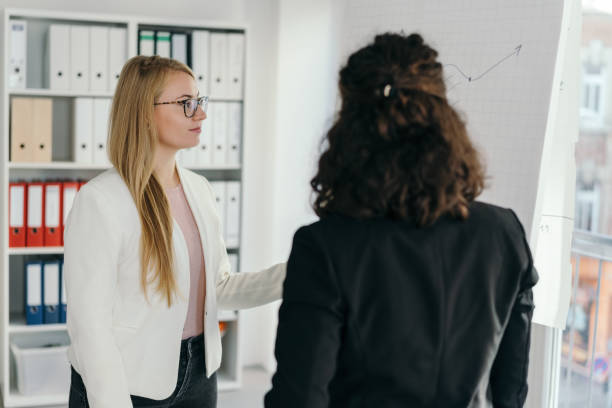 istock Two young female business partners or team 1224624217