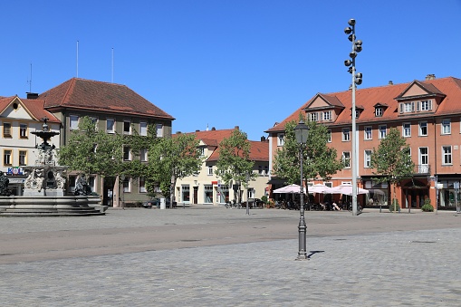 People visit Marktplatz, main square of Erlangen, Germany. Erlangen is an important town in Nuremberg Metropolitan Region (3.5 million people).