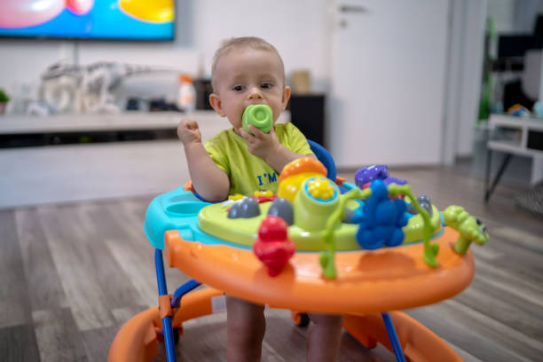 istock Baby in baby walker 1224626425