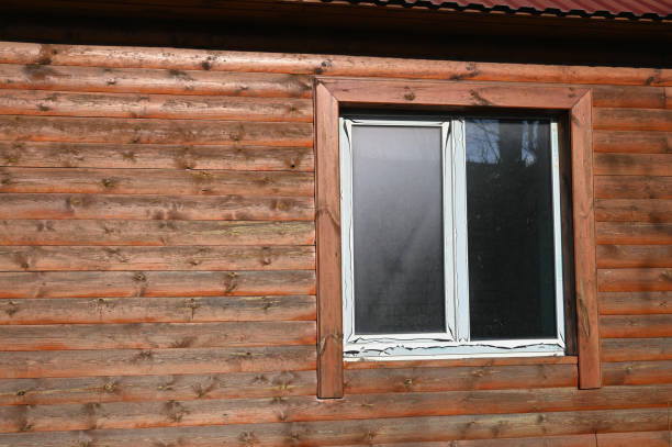 istock plastic window on wood background. Plastic window in the house 1224629159