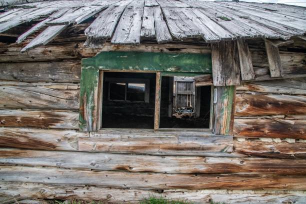 istock Old abandoned log building in western USA 1224632575