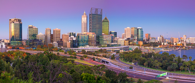 Panoramic cityscape image of Perth skyline, Australia during twilight blue hour.