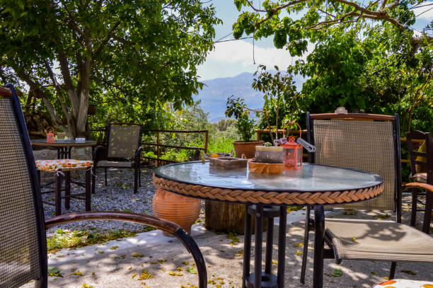 istock Shaded terrace with round tables 1224634274