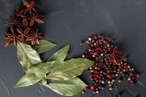istock Spices Over Wood. Pepper, bay leaf, anis 1224634810